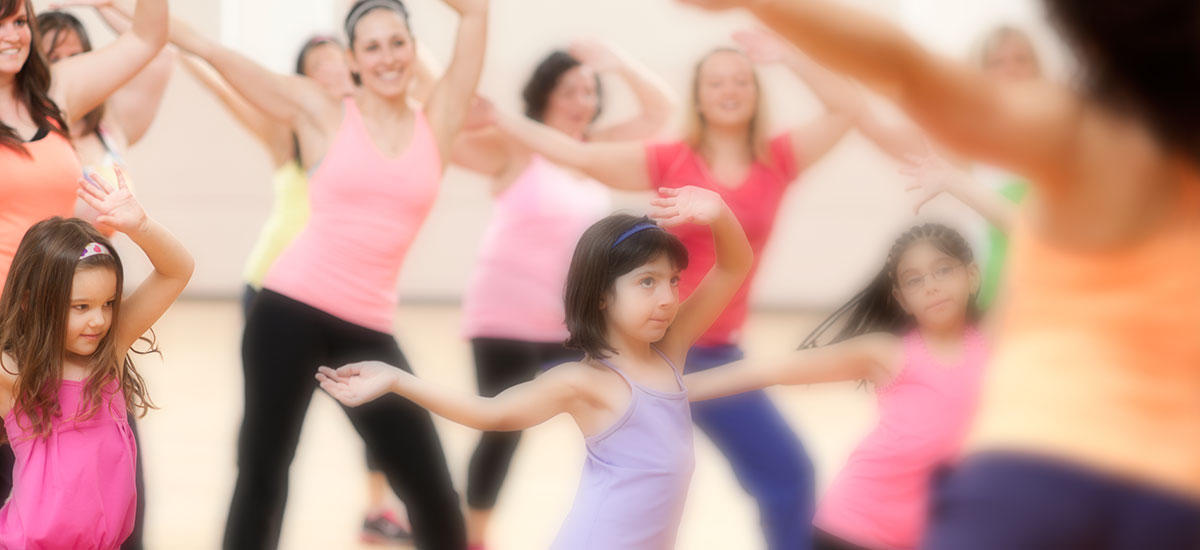 Kids and adults dancing